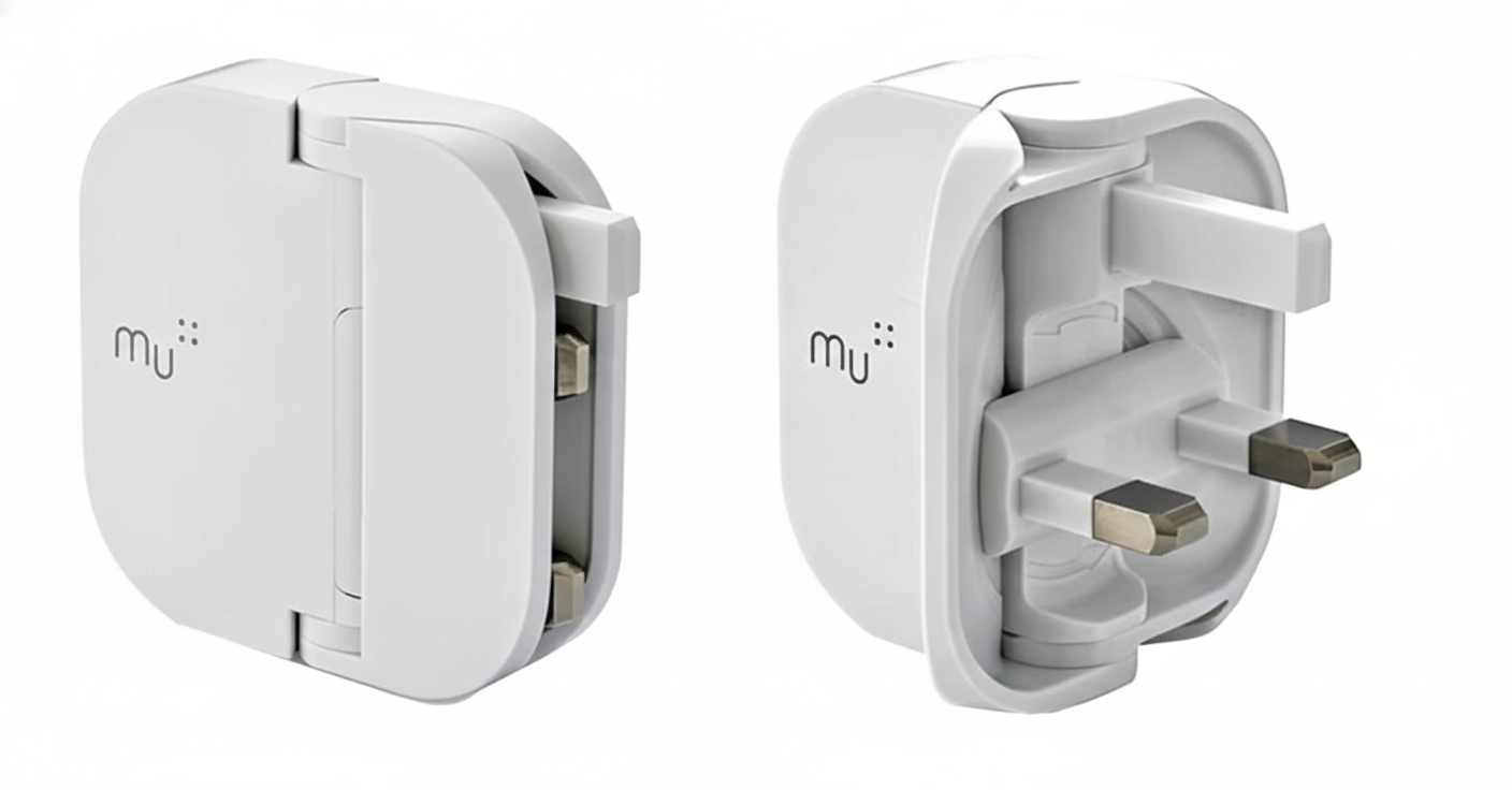 Two Mu folding plug units, one folded flat and one open with its three pins extended